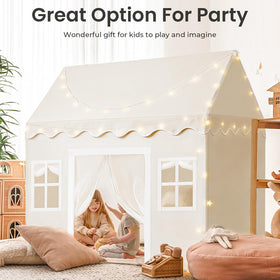 Tiny Land curtains with white polka dots add playful detail