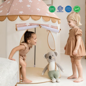 Nursery corner framed by Tiny Land khaki castle tent