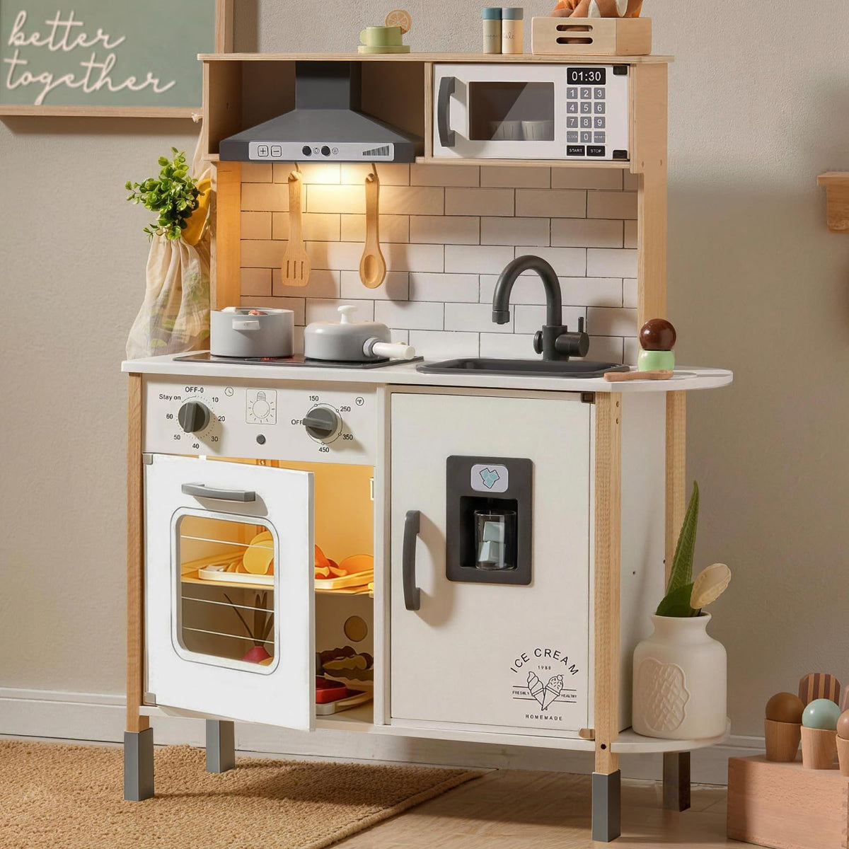 Tiny Land play kitchen stove lights enhance immersive pretend cooking experiences.