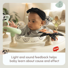 Tiny Love 360-degree swivel seat lets baby explore from every angle.