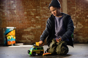 TMNT Pizza Blaster remote controller shaped like a pizza for easy driving.