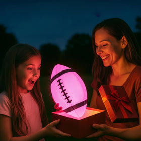 TOMLEON glow football ready for backyard, beach, and camping night games.