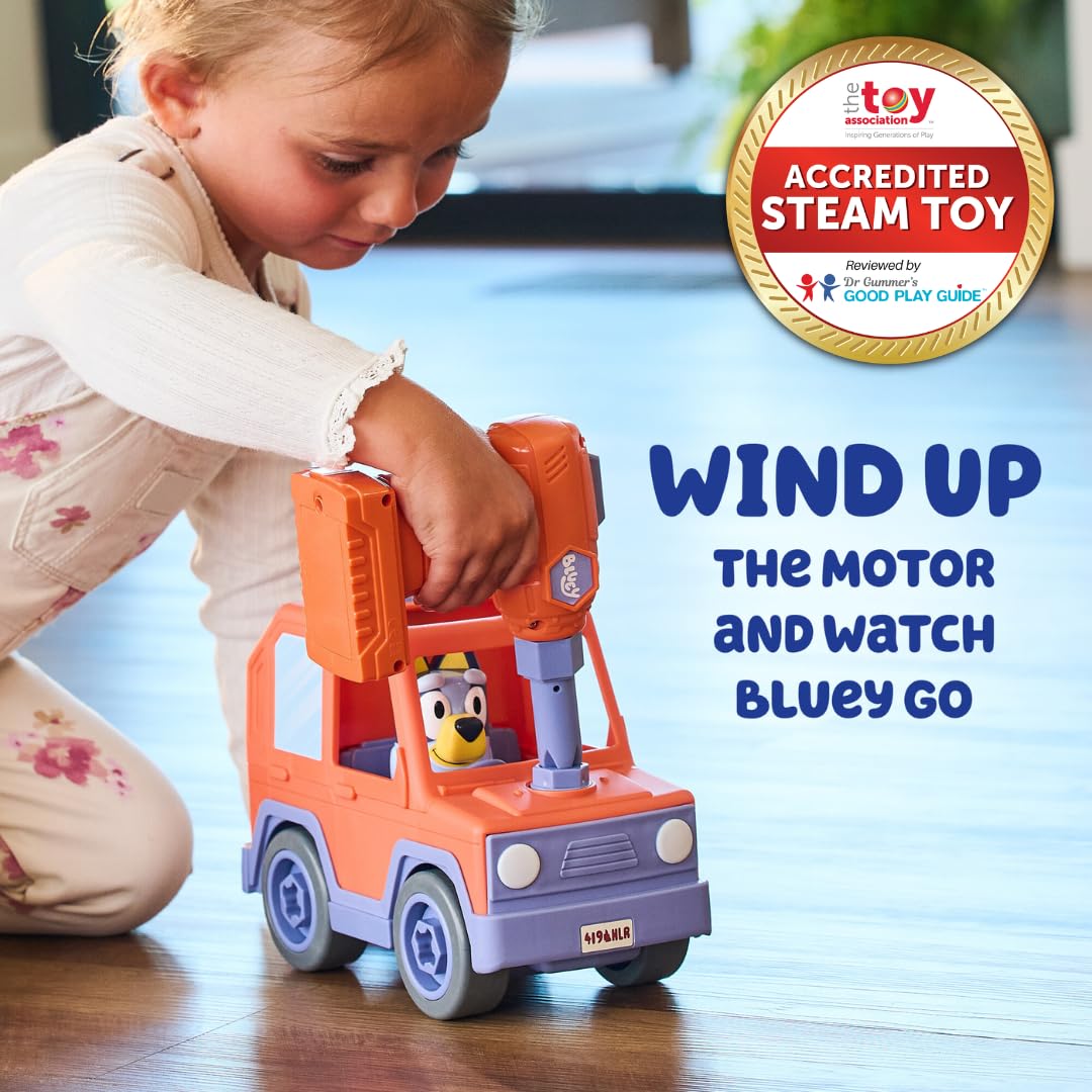 Bluey figure riding inside the car for pretend adventures.