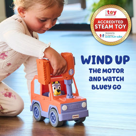 Bluey figure riding inside the car for pretend adventures.