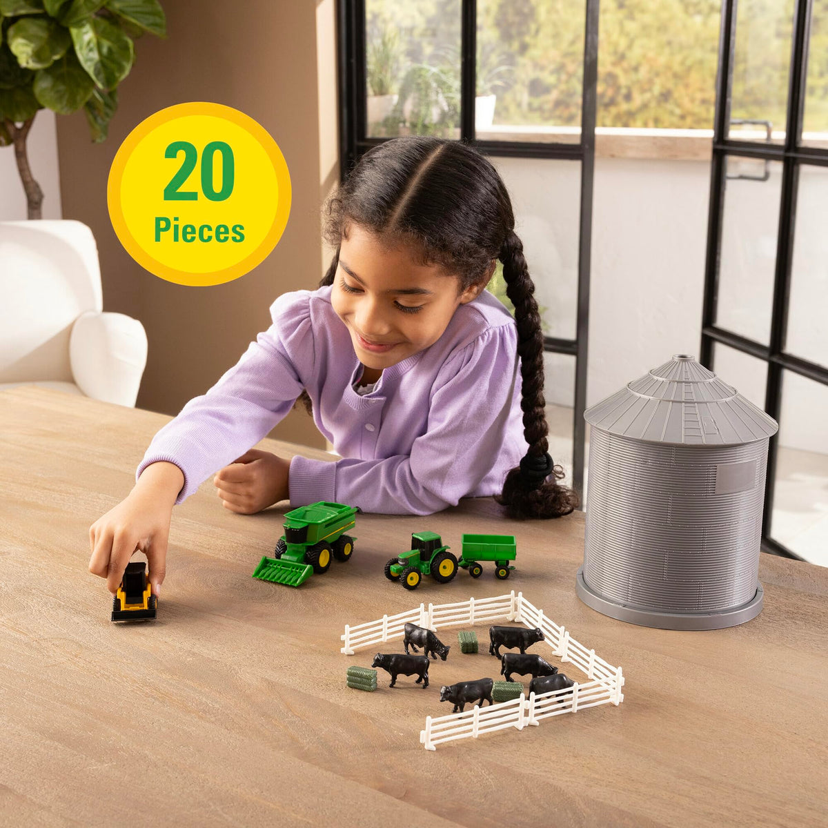 TOMY John Deere fencing with cow figures to create safe paddock layouts.
