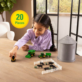 TOMY John Deere fencing with cow figures to create safe paddock layouts.