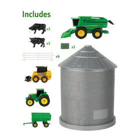 TOMY John Deere skid steer with moving bucket for interactive farming play.