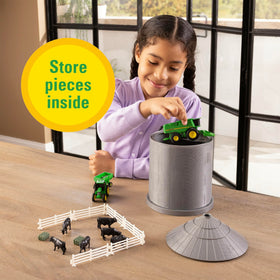 TOMY John Deere tractor toy with smooth rolling wheels for push-along fun.