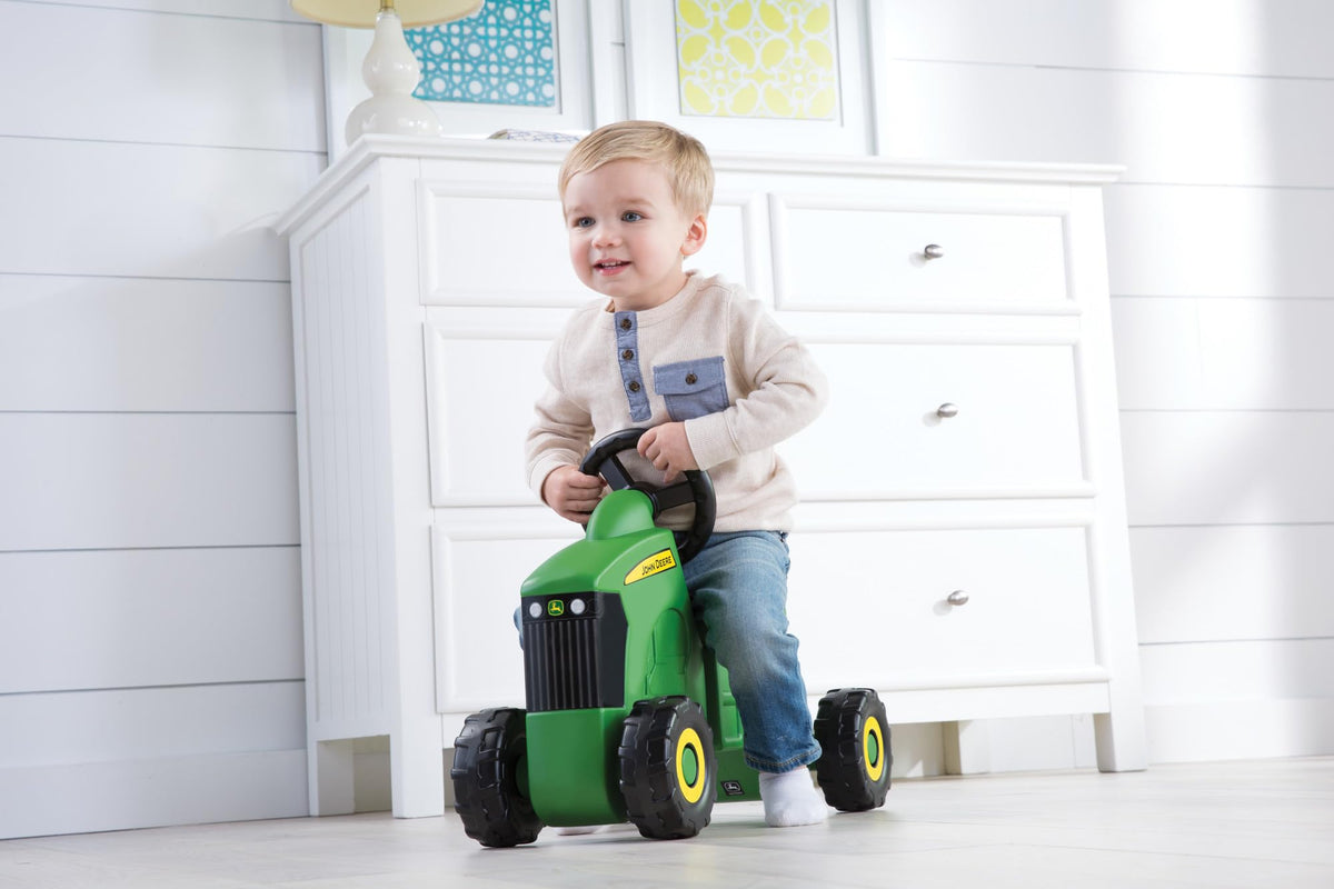 TOMY John Deere Sit N Scoot tractor wheels surface-ready for outdoor fun