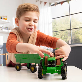 TOMY John Deere 8-inch tractor and flarebox wagon measure about 17.5 inches.