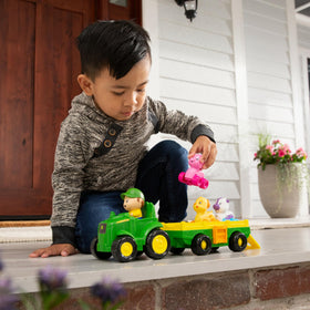 TOMY John Deere wagon seat area—practice matching animals to pictures