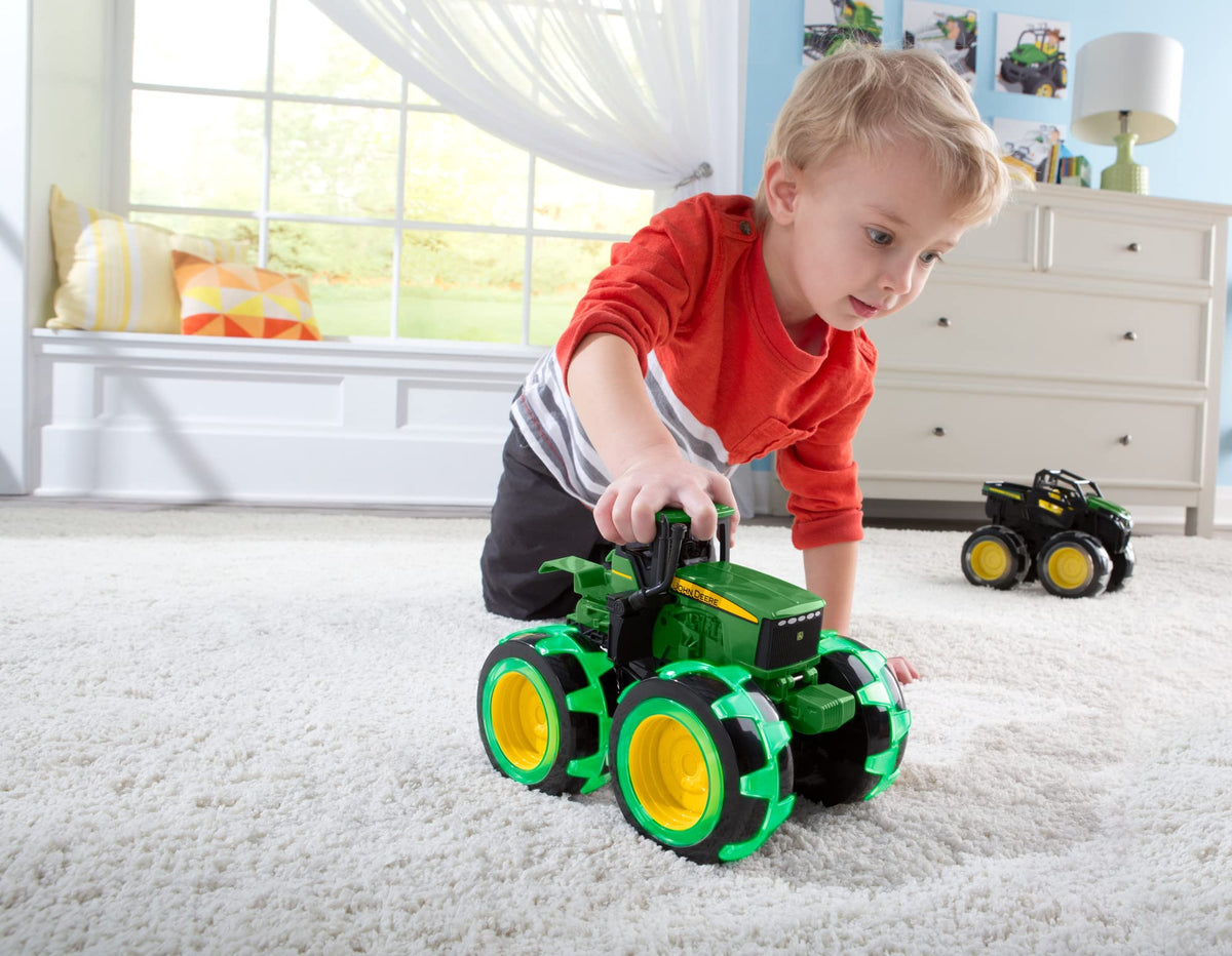 TOMY Monster Treads Lightning Wheels John Deere Tractor durable tires enable outdoor and indoor fun.