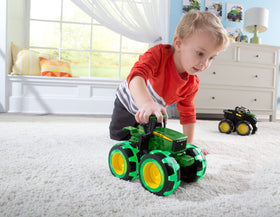 TOMY Monster Treads Lightning Wheels John Deere Tractor durable tires enable outdoor and indoor fun.