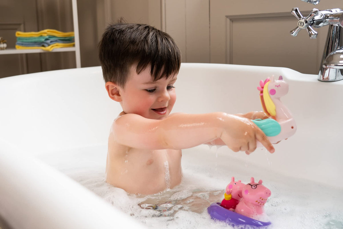 TOMY Toomies Peppa squirter set with unicorn float.