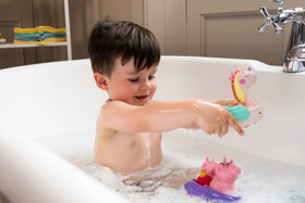 TOMY Toomies Peppa squirter set with unicorn float.