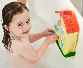 TOMY Toomies Peppa Pig House complete playset for imaginative bath time.