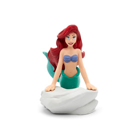 Close-up of Ariel figure showing four songs and one story in Spanish.