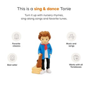 Child placing Beethoven's Wig figurine on a Toniebox for listening