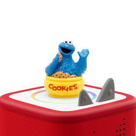 Cookie Monster holding a cookie invites kids to listen and learn.