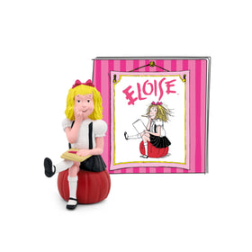 Tonies Eloise figurine beside a Plaza Hotel backdrop, inviting imaginative play.