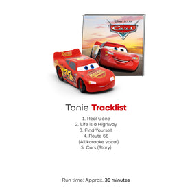 Child using Toniebox with Lightning McQueen figurine for listening adventures.