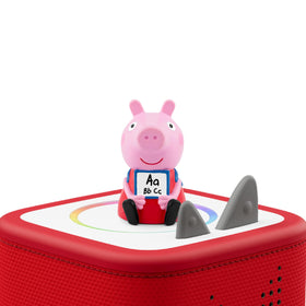 Tonies Peppa Pig figurine in hand for interactive storytelling sessions.