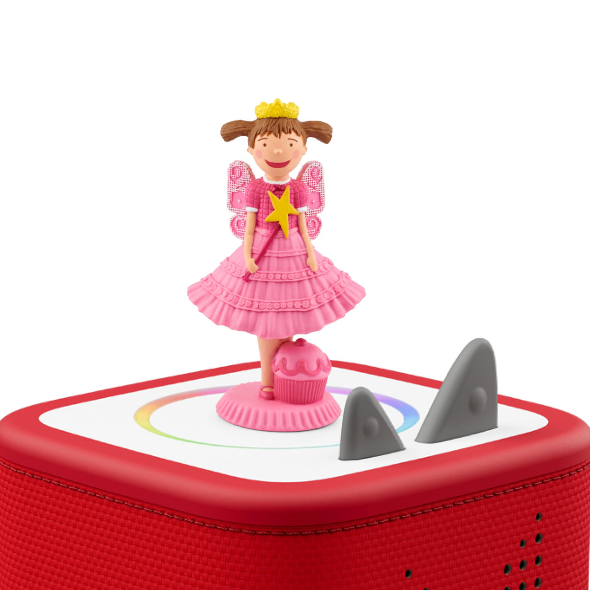 Tonies Pinkalicious figurine beside a book sparks imaginative reading moments