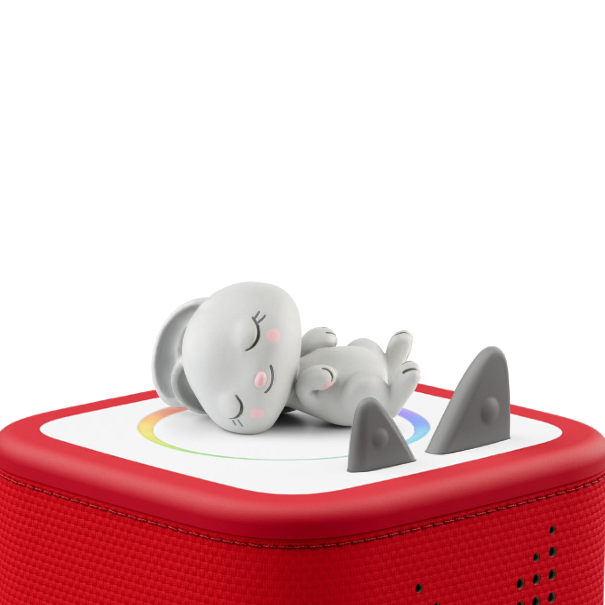 Sleepy Rabbit sits on a bed for a cozy nighttime listening moment