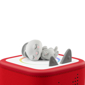 Sleepy Rabbit sits on a bed for a cozy nighttime listening moment