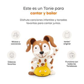 Young child dancing with Tonies Spanish Playtime Songs playing, encouraging active play.
