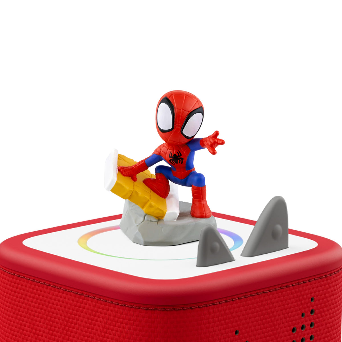 Spidey figurine close-up beside colorful packaging for storytelling