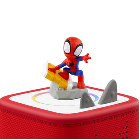 Spidey figurine close-up beside colorful packaging for storytelling