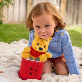 Tonies Winnie the Pooh cuddle plush packaging display.