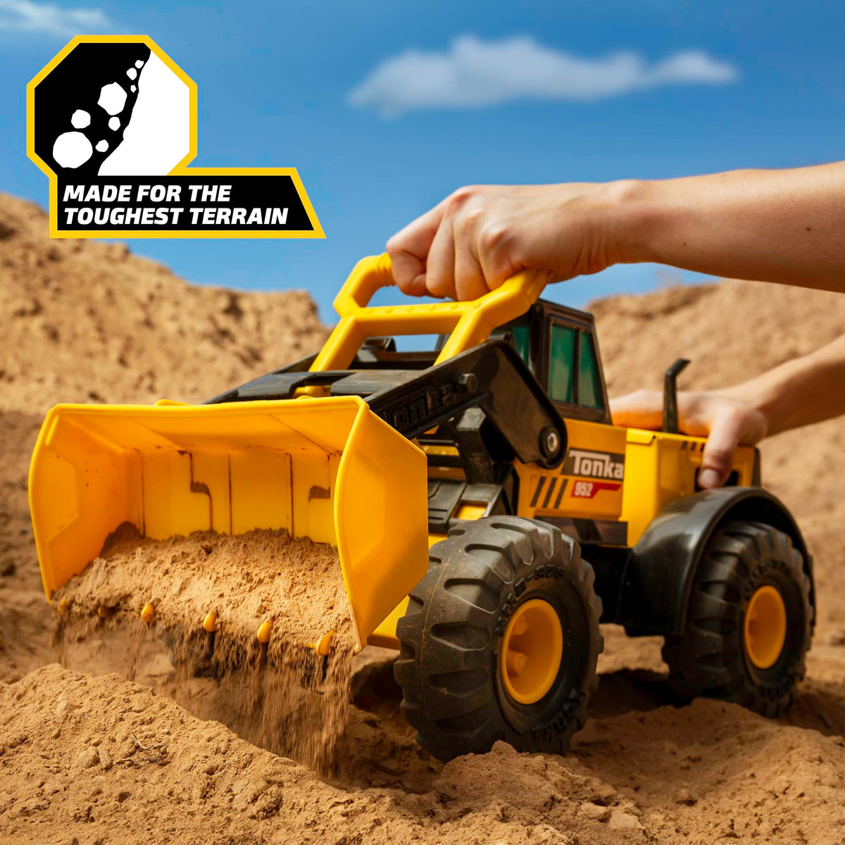 Tonka Front Loader wide twenty-one-point-five-inch chassis for stable play.