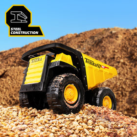 Tonka Steel Classics Mighty Dump Truck side view, big tires roll over varied surfaces