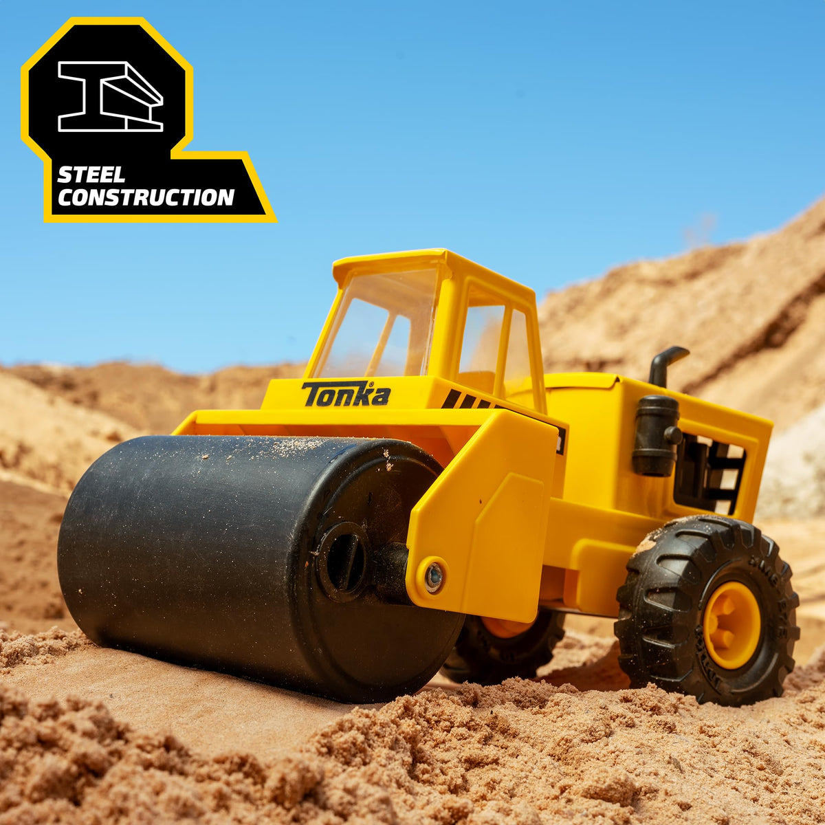 Tonka Steam Roller side view highlights sturdy steel build for rugged pretend site work.