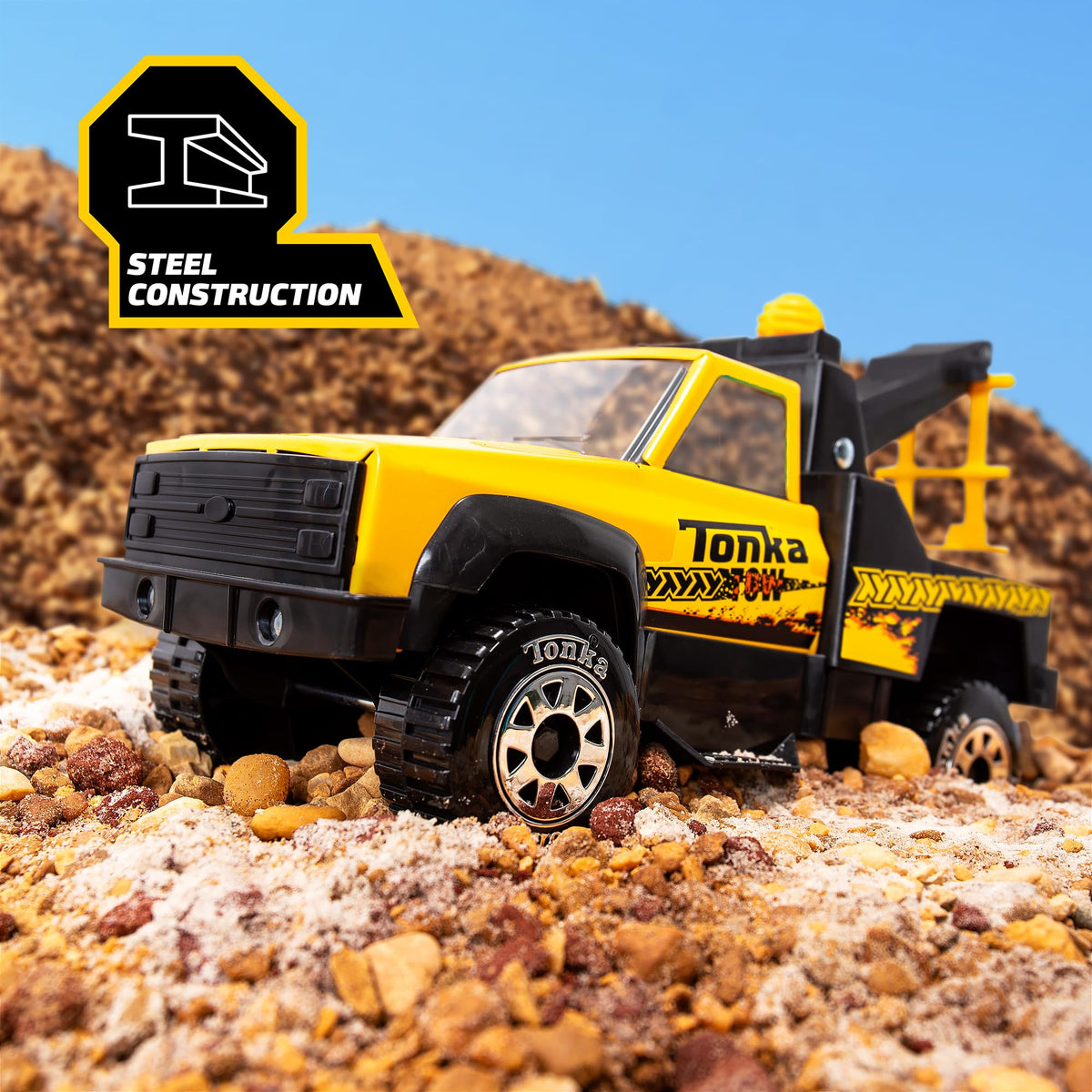 Tonka Tow Truck side view highlighting the three-position locking boom for versatile tow play.