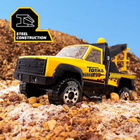 Tonka Tow Truck side view highlighting the three-position locking boom for versatile tow play.