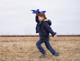 Top Secret Toys Aero Storm in-flight performing agile stunts with authentic engine sounds.