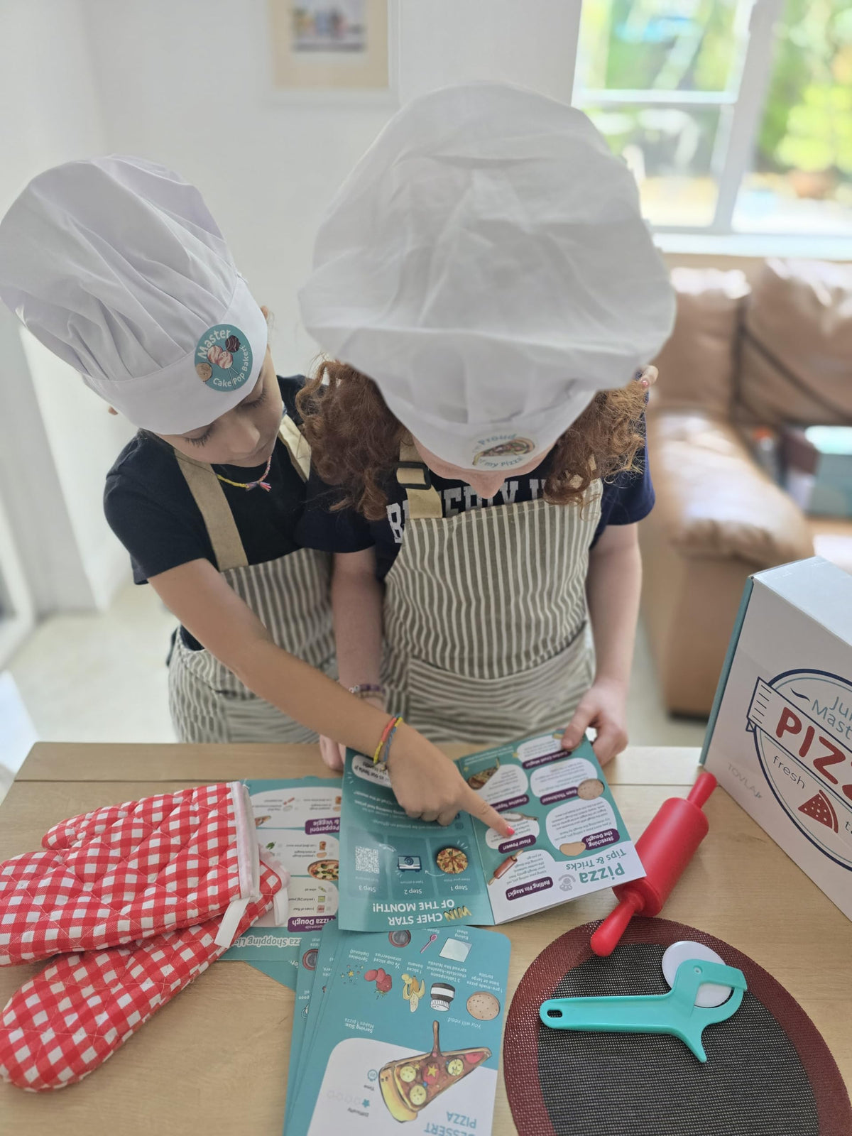 Tovla Jr chef-hat playful headwear inspiring pretend play and focus.