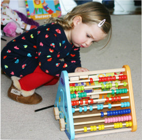 TOWO abacus with rolling beads aids basic counting and tactile learning.