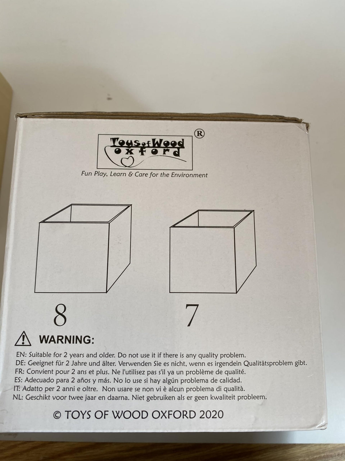 TOWO imaginative play using boxes as drums and containers