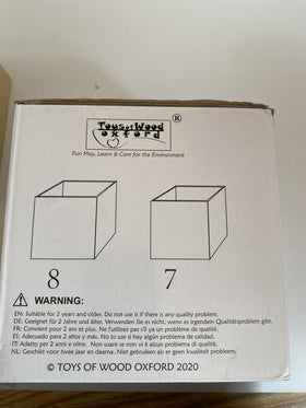 TOWO imaginative play using boxes as drums and containers