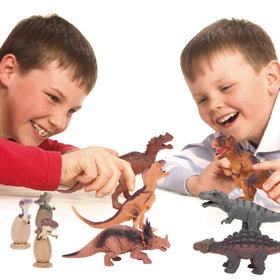 Toy Choi's dinosaur figures arranged for classroom or playroom display.