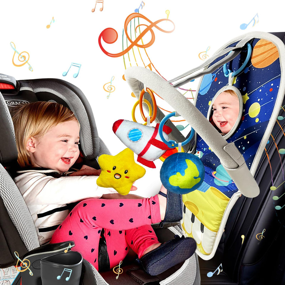 TOYMNI car-seat toy pedal-piano close-up demonstrates engaging music function for baby.
