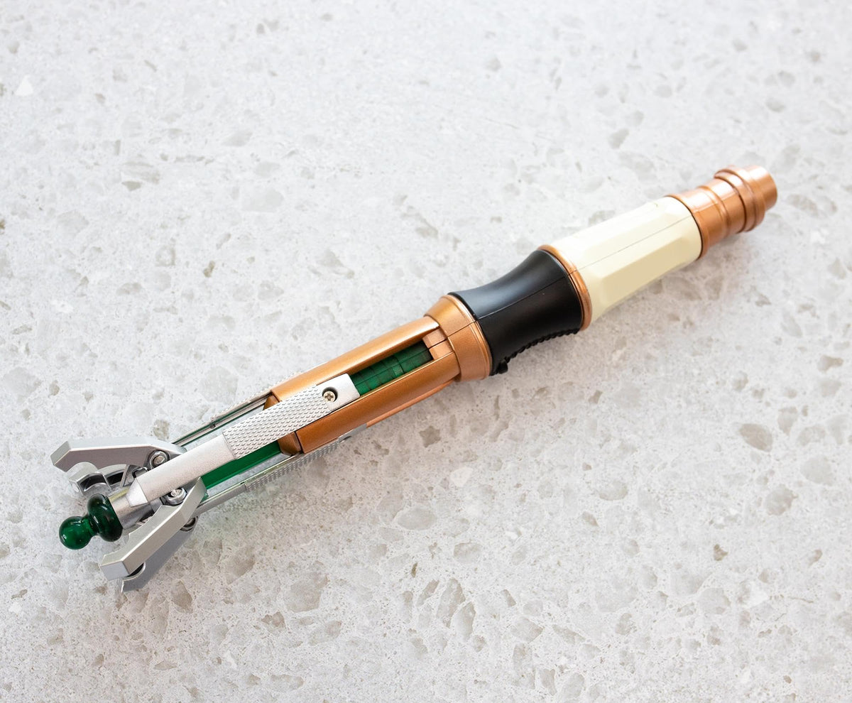 Toynk Doctor Who 11th Doctor sonic screwdriver prop official licensed badge visible.