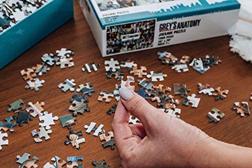 Toynk Grey's Anatomy collage puzzle logo center anchors the theme