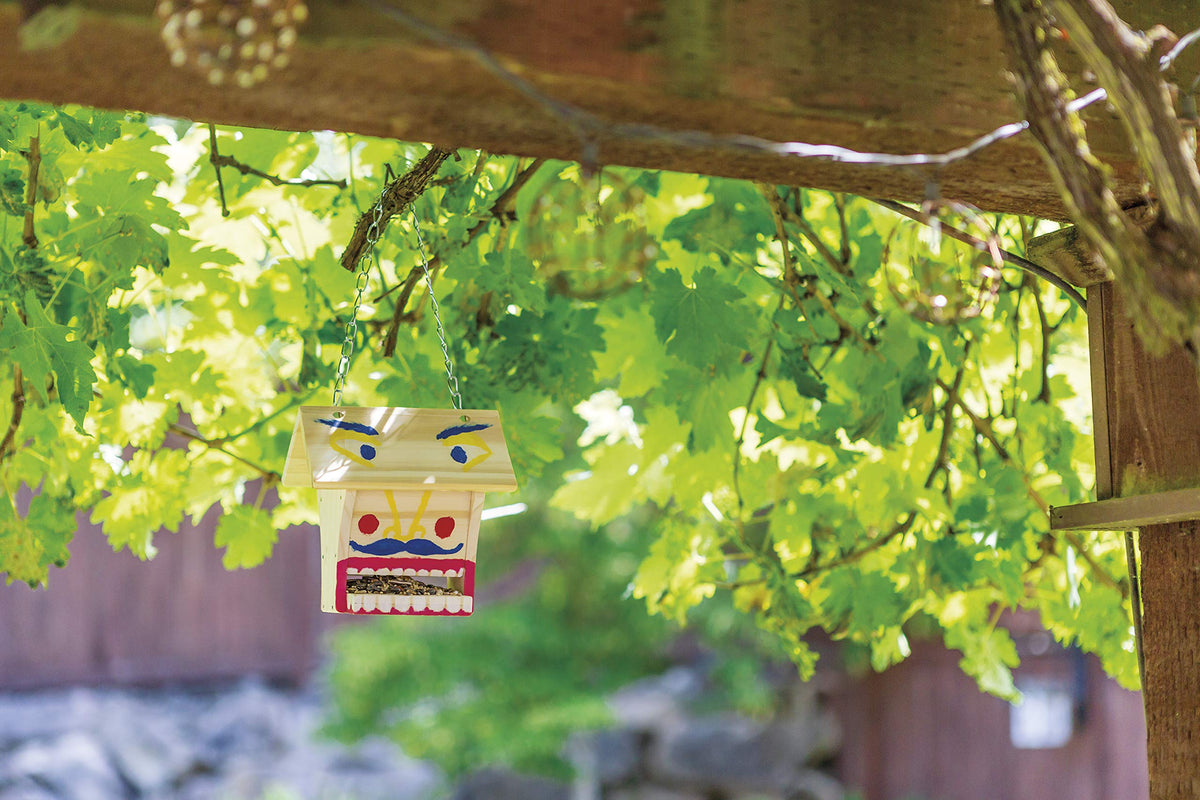 Toysmith Beetle and Bee Build A Bird Buffet hanging chain for outdoor display
