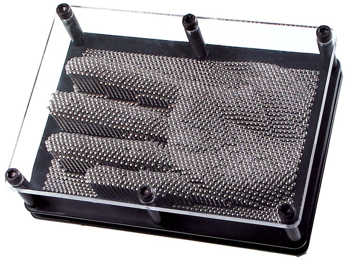 Toysmith Classic Pin Art frame displaying hundreds of movable pins forming a 3D image on a desk