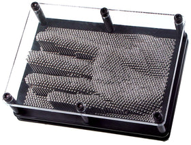 Toysmith Classic Pin Art frame displaying hundreds of movable pins forming a 3D image on a desk